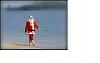 santa-walking-at-beach.jpg